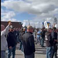 <p>Picketers gather outside ports.</p>