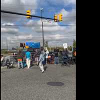 <p>A group of longshoremen picket while on strike.</p>