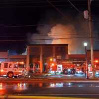 <p>Firefighters on scene at a fire at the Andalusia Bar and Grill, located at 971 Bristol Pike, which broke out around 4 a.m. on Thursday, Oct. 10.</p>