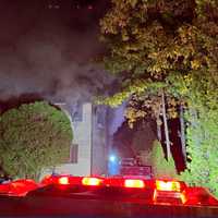 <p>Emergency crews responding to a house fire in the 3000 block of Sugan Road on Wednesday, Oct. 16, 2024.
  
</p>