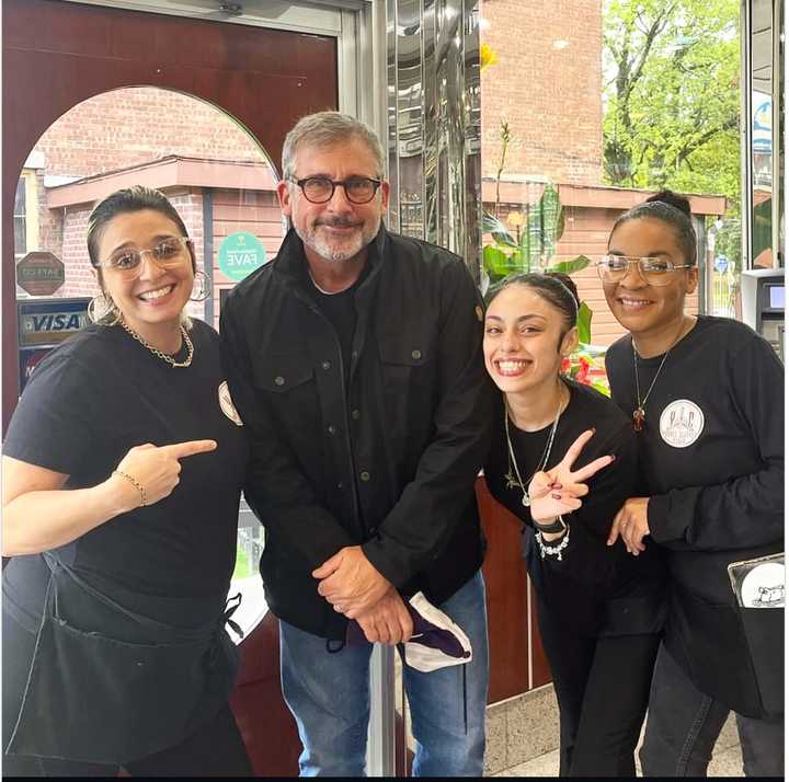 Staff poses with star comedian Steve Carell after he visited for dinner.&nbsp;