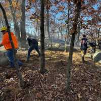 <p>Firefighters from the region cut fire lines to help stop the flames.&nbsp;</p>