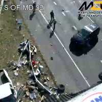 <p>The aftermath of the tractor-trailer crash in Anne Arundel County.</p>