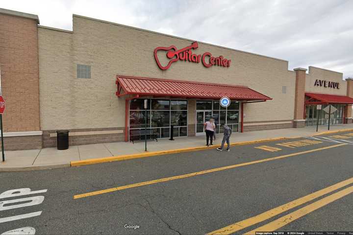 Screaming Woman Points Gun At Customers In Plymouth Guitar Store: Police (VIDEO)