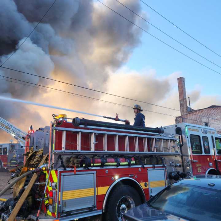 Philadelphia fire crews at a three-alarm fire in a warehouse in the area of Kensington and Allegheny avenues on Wednesday, Nov. 13, 2024.