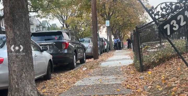 Police officers securing the scene of a double murder-suicide in the 7300 block of East Walnut Lane in Philadelphia on Wednesday, Nov. 20, 2024.