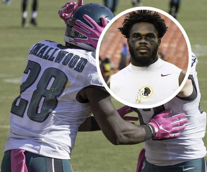 Eagles Running Back Wendell Smallwood celebrates a touchdown with a teammate;&nbsp;Smallwood with the Washington Redskins in 2019, holding Josh Adams's jersey.