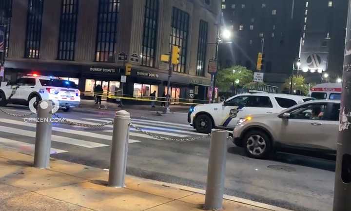 The police on the scene where the two men were struck in the crosswalk at Juniper and Market streets.