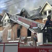 <p>Firefighters battling the blaze in Norristown.</p>