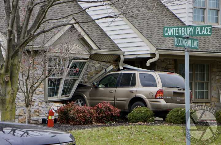 The scene of the vehicle into a home on Buckingham Lane in Leacock Township.