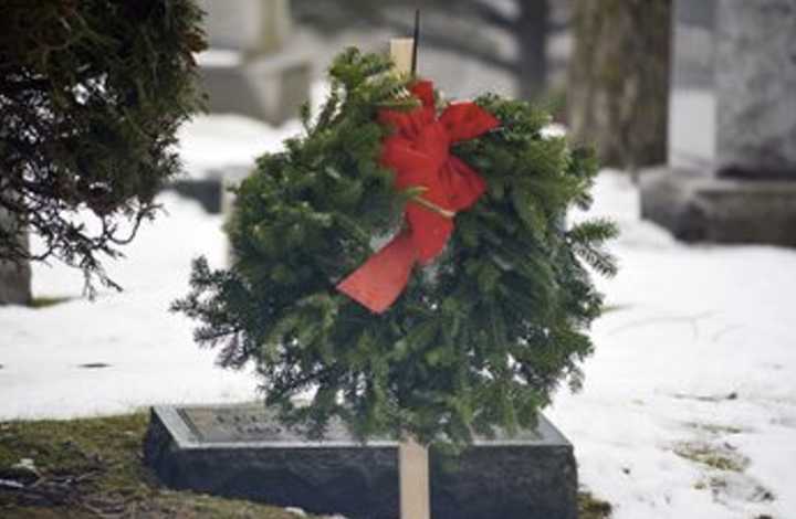 A wreath on a grave.