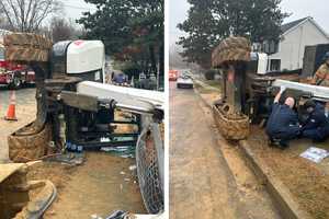 Emergency Crews Rescue Person Pinned Under Excavator In Virginia