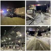 <p>The wreck of the tractor-trailer crash into the PA Turnpike toll booth.</p>