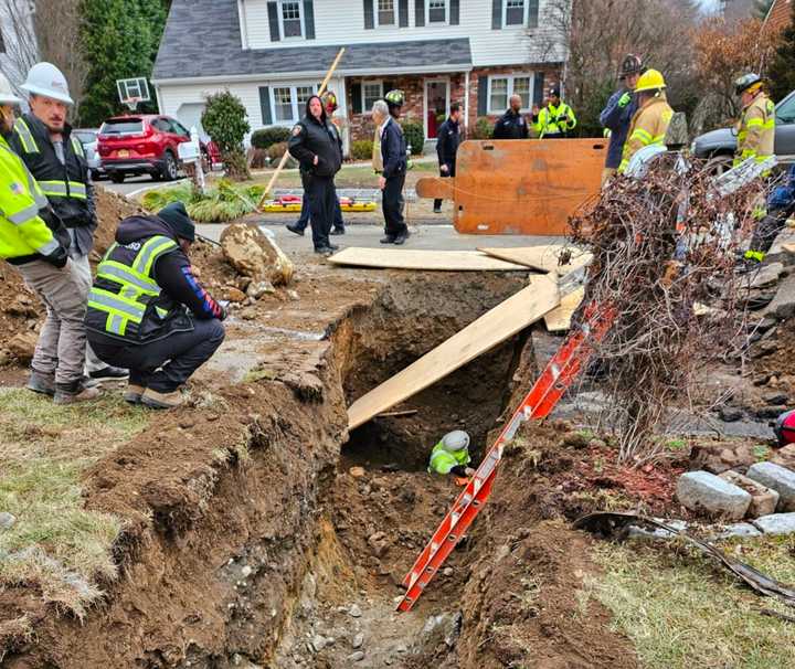 A worker suffering from hypothermia and a minor arm injury was rescued from a trench Friday morning, Dec. 20, on Hampton Road in Stamford.&nbsp;