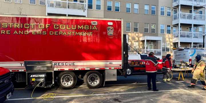 Workers at the scene in DC.