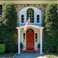 <p>Mary Tyler Moore's former Greenwich mansion features a door as red as her hair.&nbsp;</p>