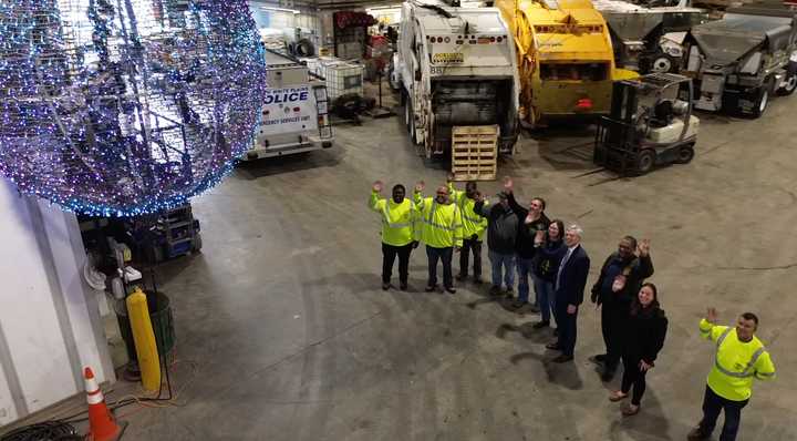 White Plains officials and government workers take a look at the city's New Year's Eve ball ahead of its yearly celebration. 