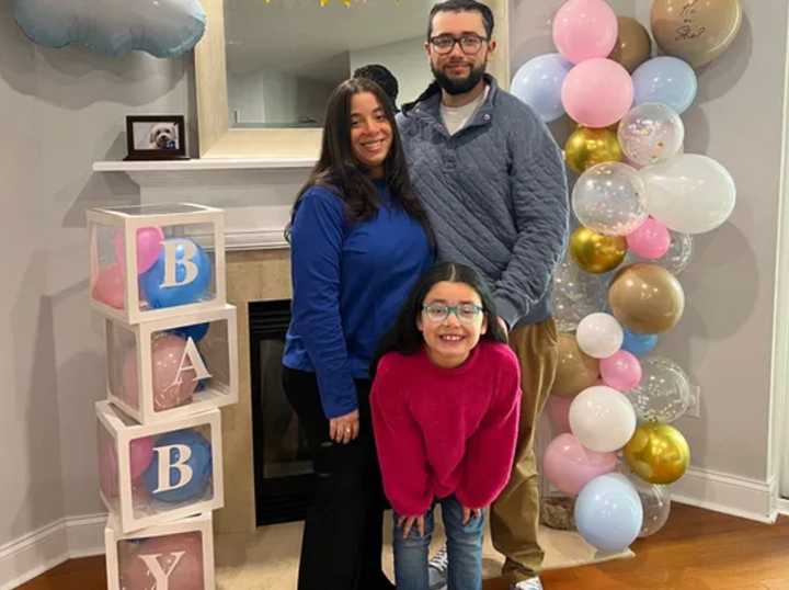 Julissa Padilla pictured with her husband and 8-year-old daughter. 