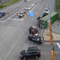 <p>The scene of the rolled-over tractor-trailer on Route 22.</p>