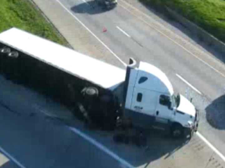 The scene of the tractor-trailer rollover crash.