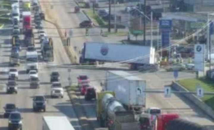 The scene of the tractor-trailer stuck in a construction hole on Route 30.