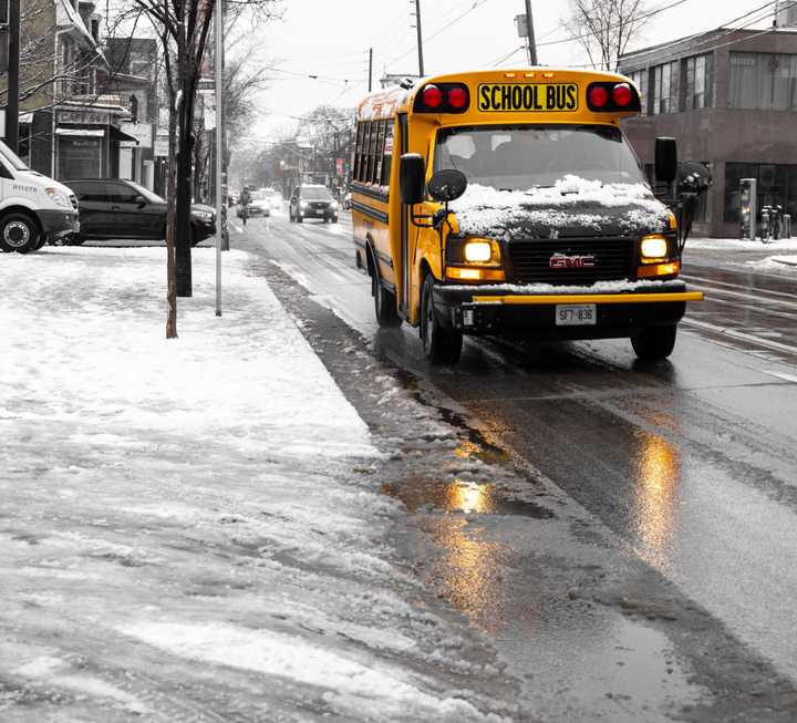 Snow covered school bus