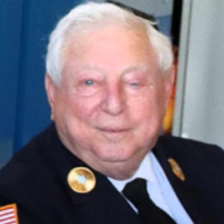 Long time fire department Chaplain Arthur Klamka. 