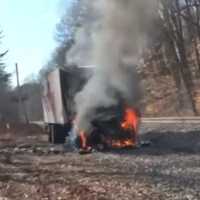 Stolen FedEx Truck Erupts In Flames Along Maryland Train Tracks: Fire ...