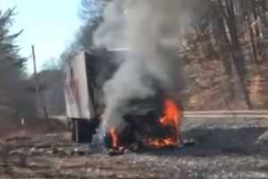 Stolen FedEx Truck Erupts In Flames Along North East Train Tracks: Fire Marshal