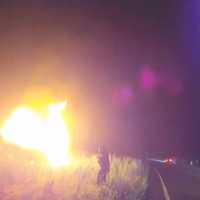 Cop, Passers-By Pull Woman From Burning Car After Fiery HV Crash (VIDEO)