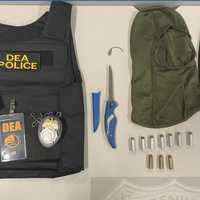 <p>Police found balaclava masks, a large canister of pepper spray, a tactical vest, fake DEA identification badges, a knife, and 10 rounds of .44 Magnum ammunition in Gentian Gjana's car, police said.</p>