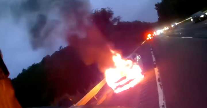 The car blaze on the Taconic State Parkway in Yorktown on Friday morning, July 11. 