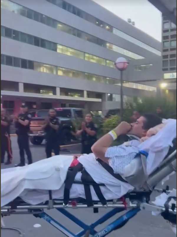 VIDEO: Hit By Speeding Bus, Roseland Cop Leaves Hospital On Stretcher In Emotional Sendoff
