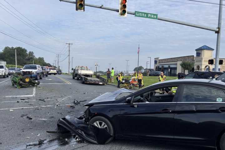 PHOTOS: Sedan Collides With Trailer Carrying John Deere Mower In Lititz, Police Say