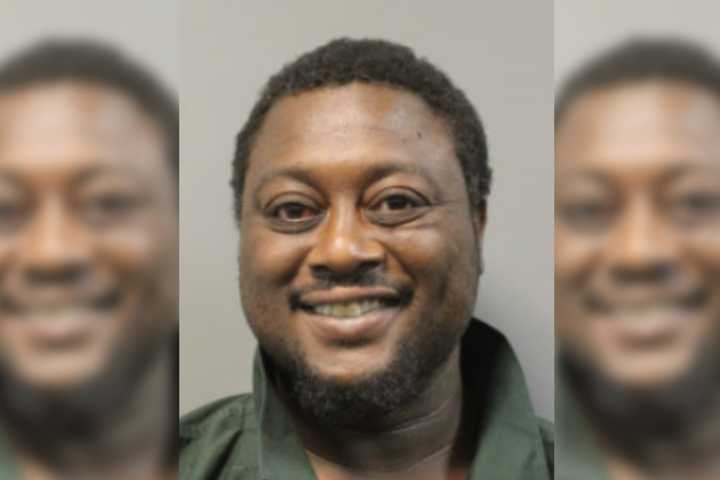 DC Man Linked To Rape, Armed Maryland Bank Robbery Grins For Mugshot: Police