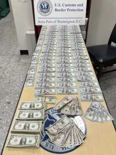 Stacks Of Cash Stuffed In Suitcases Seized At Dulles, Traveler Loses Global Entry: CBP