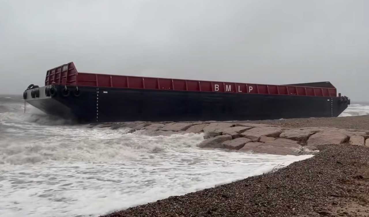 High winds and heaving seas pushed two barges onto Woodmont Beach in Milford on Thursday, Oct. 30. High winds and heaving seas pushed two barges onto Woodmont Beach in Milford on Thursday, Oct. 30.