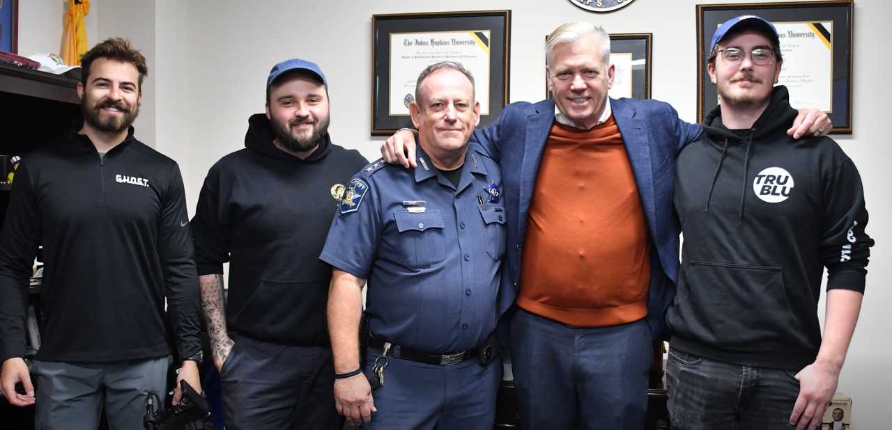 Chris Hansen with members of the Harford County Sheriff's Office.