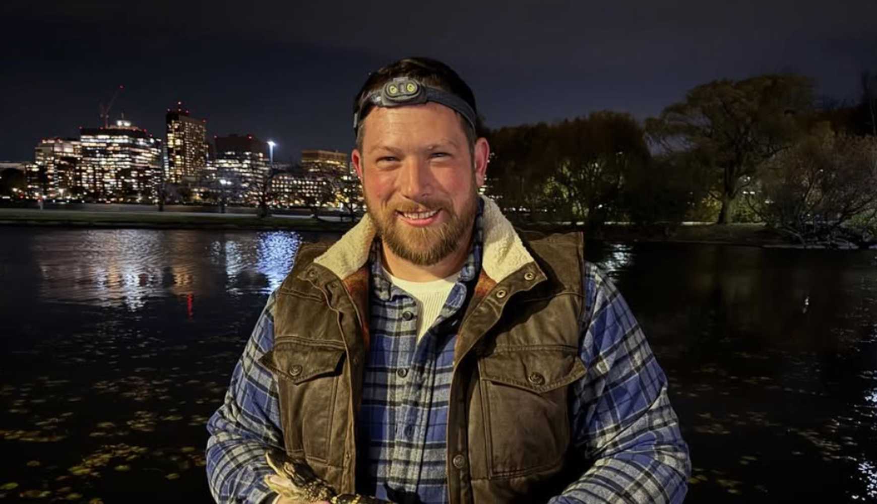 
Joseph Kenney, of Joe's Crazzy Critters, holds the alligator he rescued from the Charles River in Boston's Back Bay on Tuesday, Oct. 11. 
  

