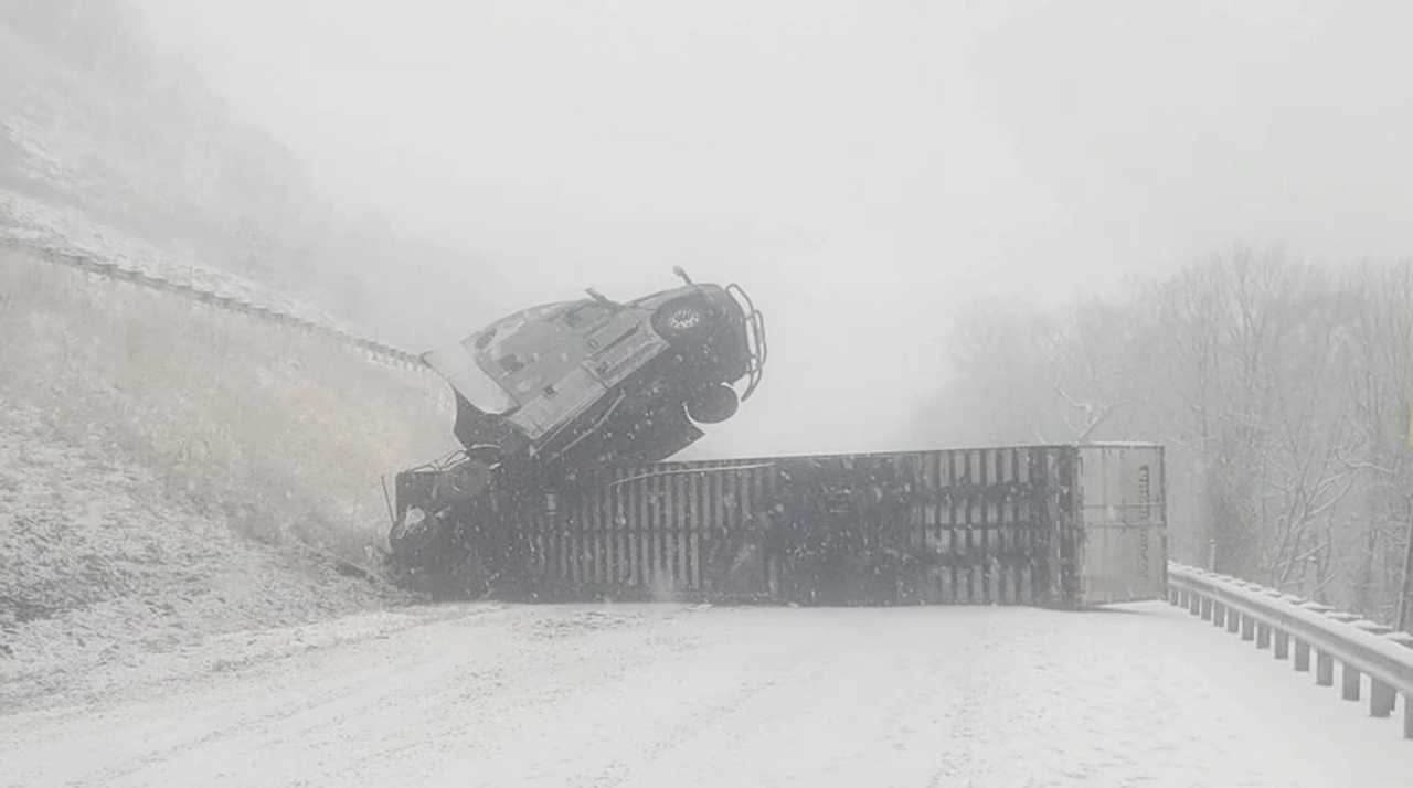 The scene of the overturned ice cream truck in the snowstorm.