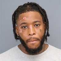 Domestic Call In Waldorf Ends With Car In Creek, Fugitive In Cuffs: Sheriff