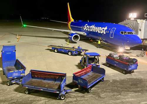 Southwest Officially Ends 39 Bags - Southwest Boeing 737 800 At KISP Gate A8 December 30 2023 
