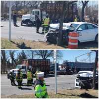 Sedan Smashed, Tree Truck Damaged In East Meadow Car Crash