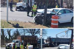 Sedan Smashed, Tree Truck Damaged In East Meadow Car Crash