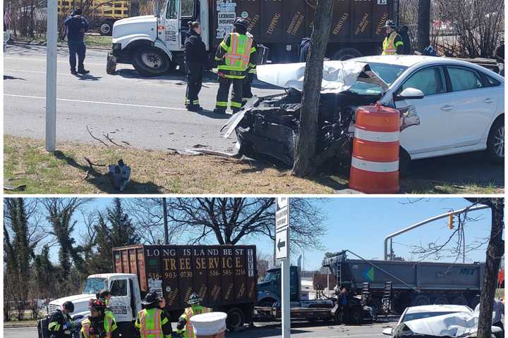 Sedan Smashed, Tree Truck Damaged In East Meadow Car Crash