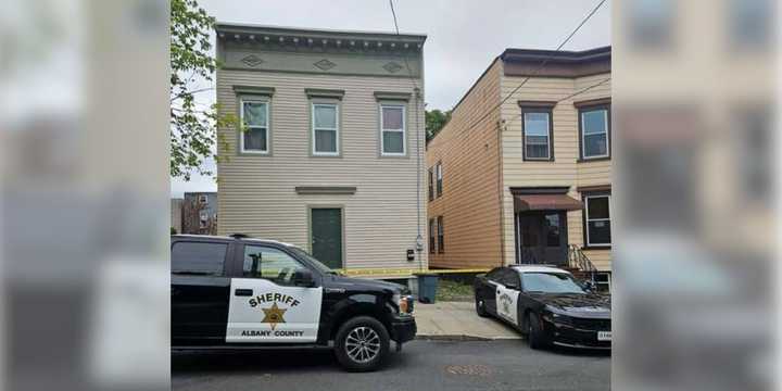 Albany County Sheriff's deputies arrested a suspect after a decomposed body was found inside a Sheridan Avenue residence in Albany on Thursday, July 11.