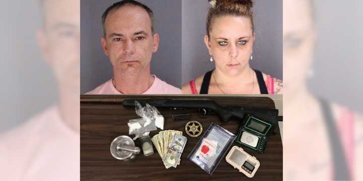 Jacen Blair, age 46, and Rebecca Gorman, age 33, pictured with drugs and cash allegedly found in their&nbsp;Hoosick Falls home Friday, July 12.&nbsp;