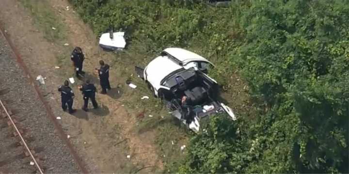 A car was heavily damaged after being struck by a Long Island Rail Road train in Manorville on Tuesday, July 30.