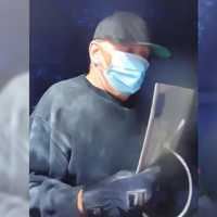 <p>Surveillance footage of a home invasion robbery on Daisy Lane in Commack on Friday, Sept. 13.</p>