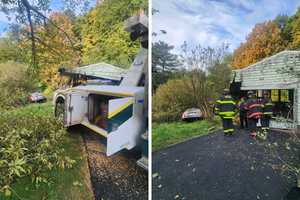 Car Rolls Down Hill Into Building, Ditch In Mount Kisco